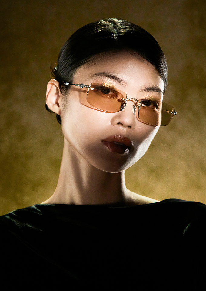 Portrait wearing rose-gold Ptolemy48 eyewear